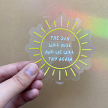 Load image into Gallery viewer, The Sun Will Rise and We Will Try Again Rainbow Maker (Suncatcher Sticker)