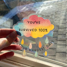 Load image into Gallery viewer, You&#39;ve Survived 100% Of Your Hardest Days Rainbow Maker (Suncatcher Sticker)
